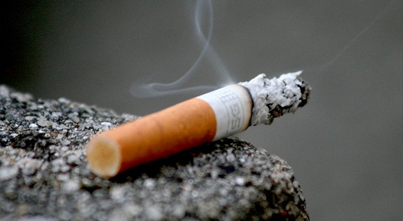 Курение сигарет Курение сигарет